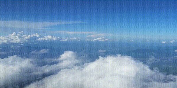 Blue sky above the clouds, the viewer is based atop Mount Fuji Japan.